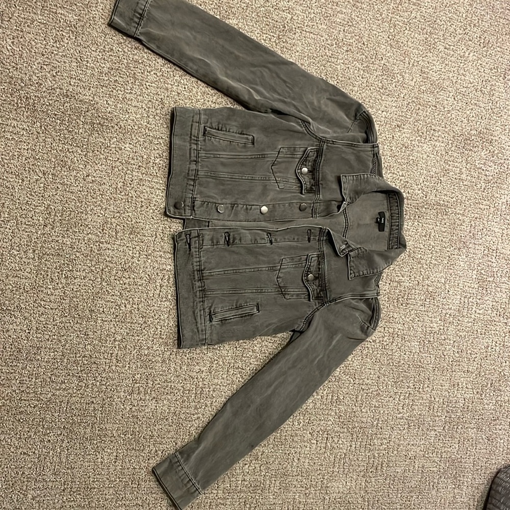 Faded black Jean jacket with puffy shoulders. Size L